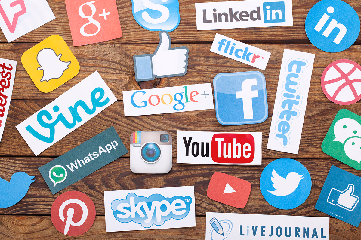 an image of paper cut out of social media channels logos like Facebook, Instagram, LinkedIn, Twitter, Snapchat and many more