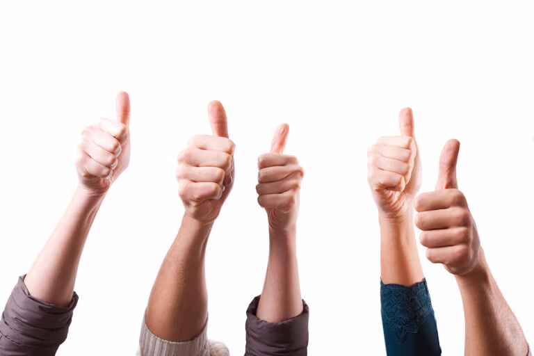 Online reviews and customer feedback - an image of five hands, all raised, and all are showing a thumbs up.