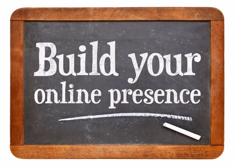 The sentence "Build your online presence" written on a chalkboard.