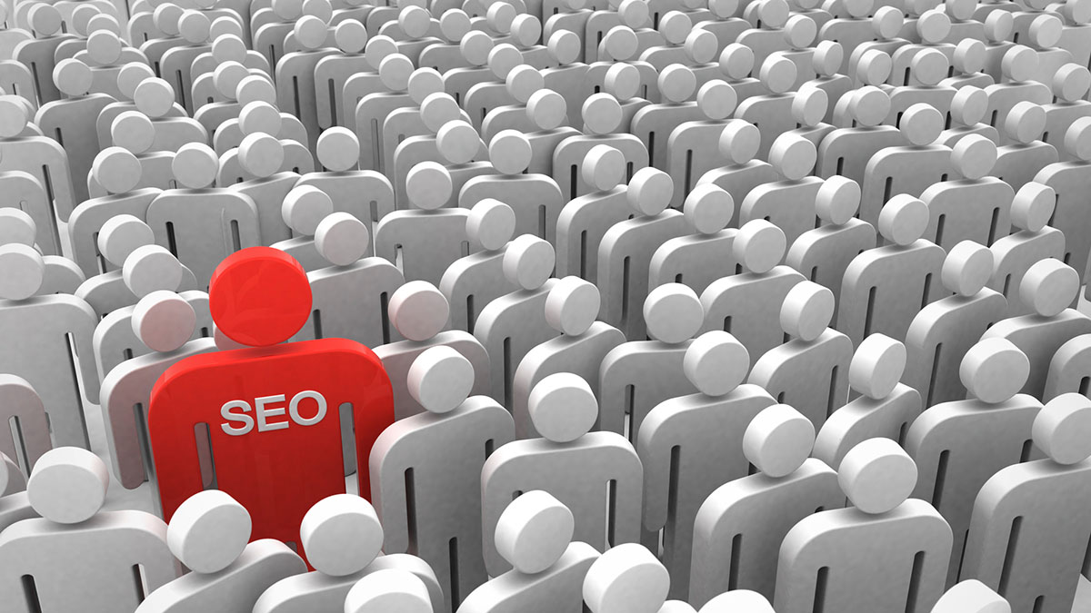 The benefits of SEO: statue of a red SEO man towering over the regular white ones in the group