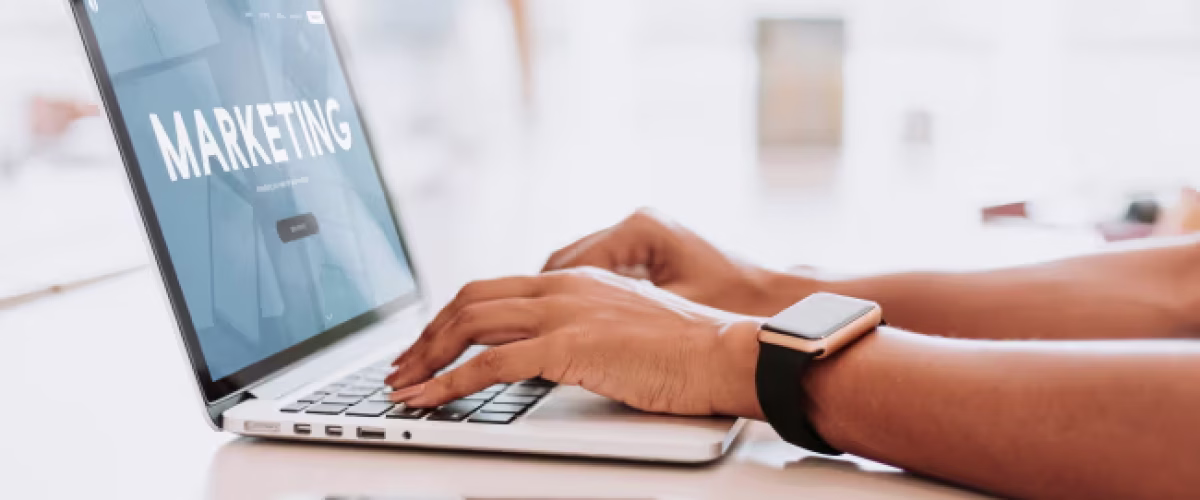 hands on a laptop